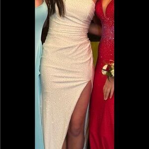 White maxi sheath dress with ruched details and a high slit for prom